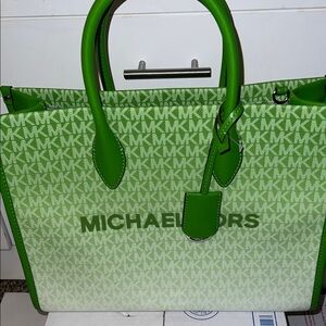 Michael Kors Mirella Medium Ombré Logo Tote Bag in the color Jungle Green.
